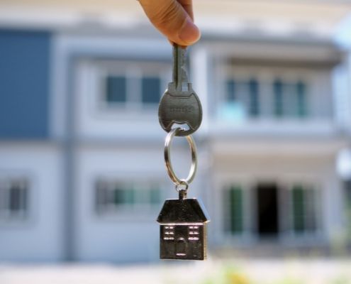 photo of key infront of a new home